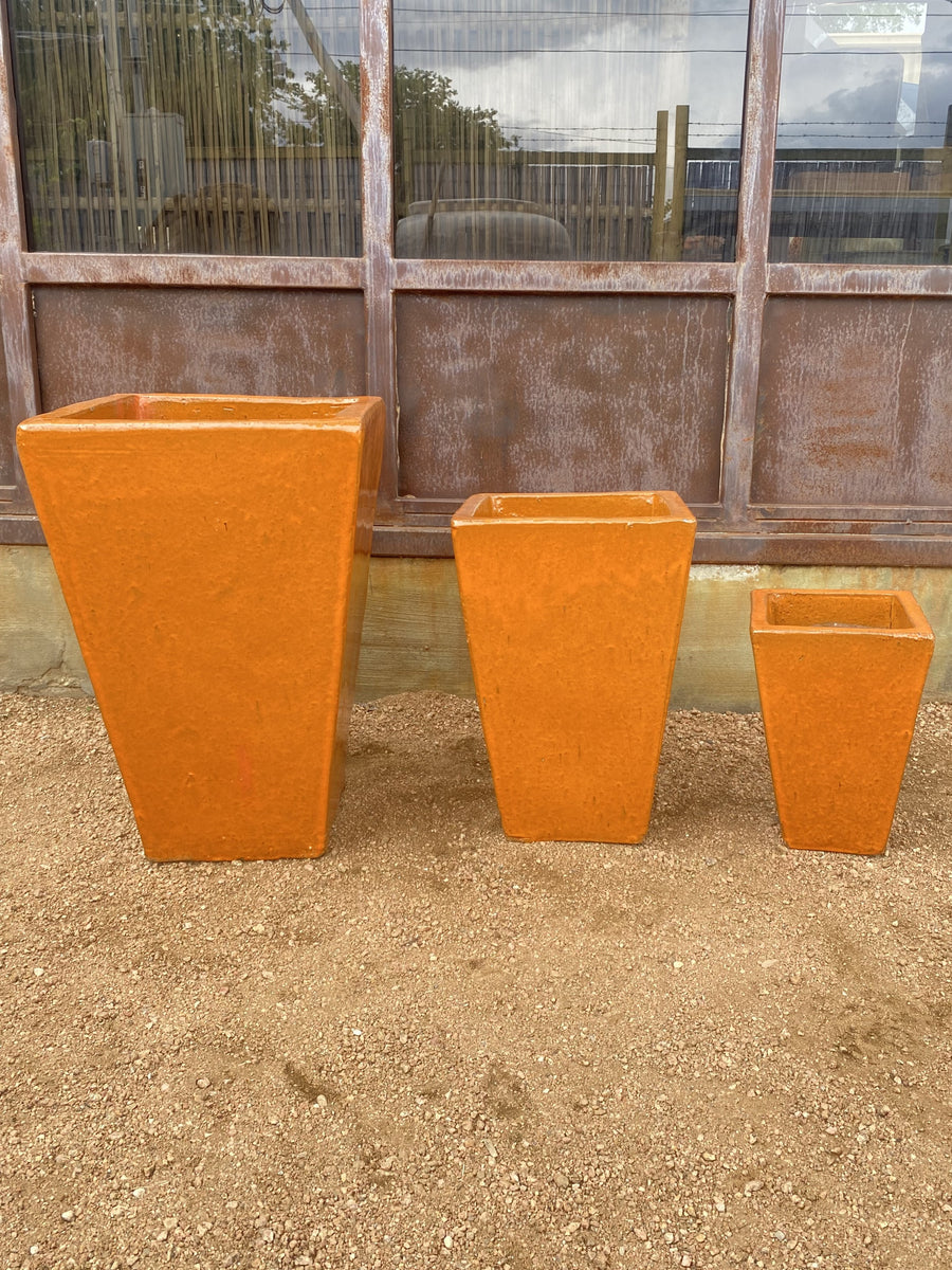 bright orange plant pot Bright Orange Square Tapered Planter – Big Grass